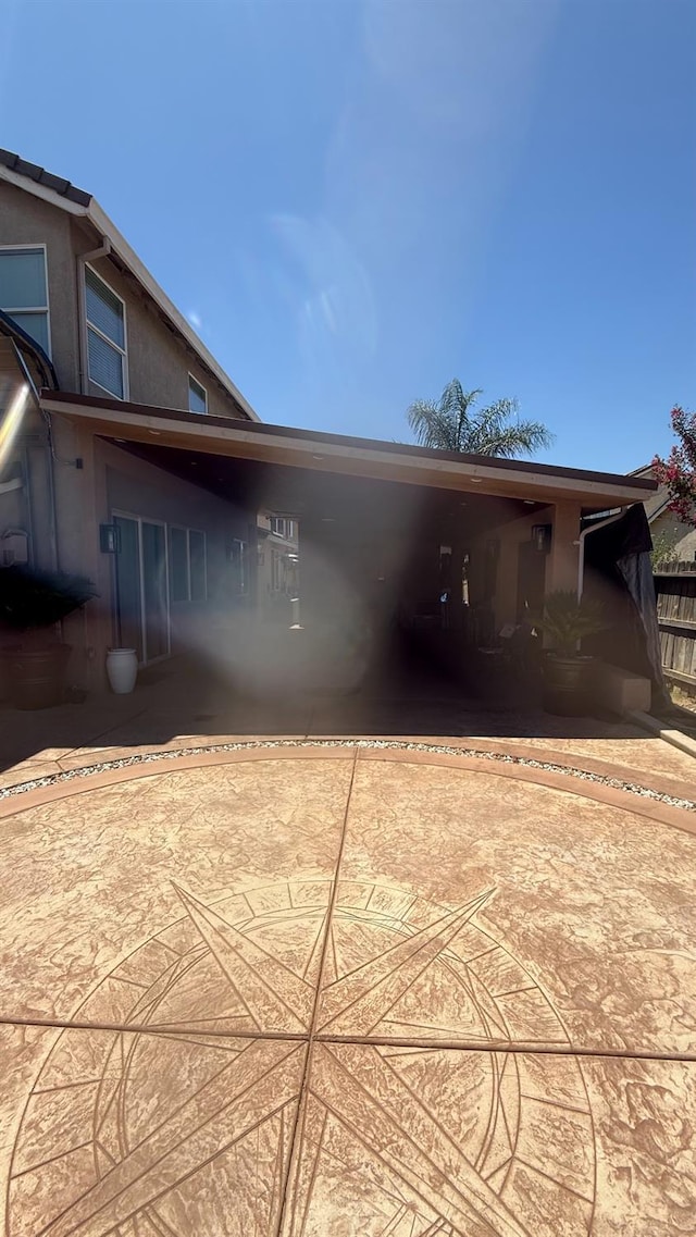 5335 E Hoxie Ave, Fresno, CA 93725 - view of side of home featuring stucco siding