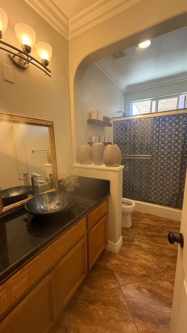 5335 E Hoxie Ave, Fresno, CA 93725 - full bathroom featuring a stall shower, vanity, ornamental molding, and tile patterned floors