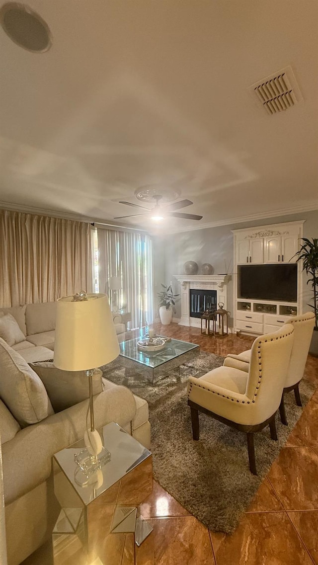 5335 E Hoxie Ave, Fresno, CA 93725 - living area with a glass covered fireplace and ceiling fan