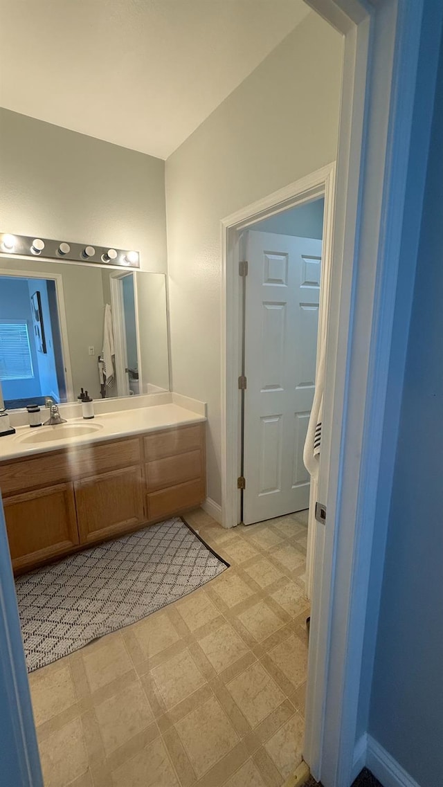 5335 E Hoxie Ave, Fresno, CA 93725 - bathroom with vanity and tile patterned floors