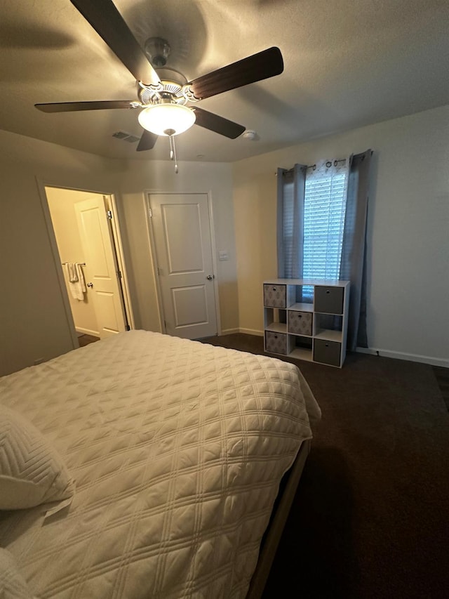 1905 George Ave, Sanger, CA 93657 - bedroom with a ceiling fan and dark colored carpet