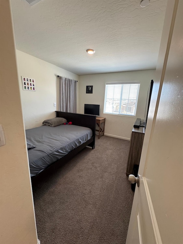 1905 George Ave, Sanger, CA 93657 - bedroom with carpet and a textured ceiling