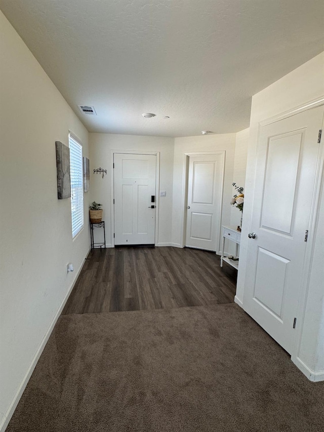 1905 George Ave, Sanger, CA 93657 - foyer entrance with carpet flooring and wood finished floors