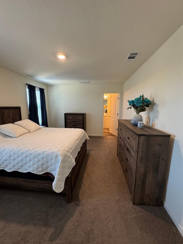 1905 George Ave, Sanger, CA 93657 - bedroom featuring dark colored carpet and baseboards