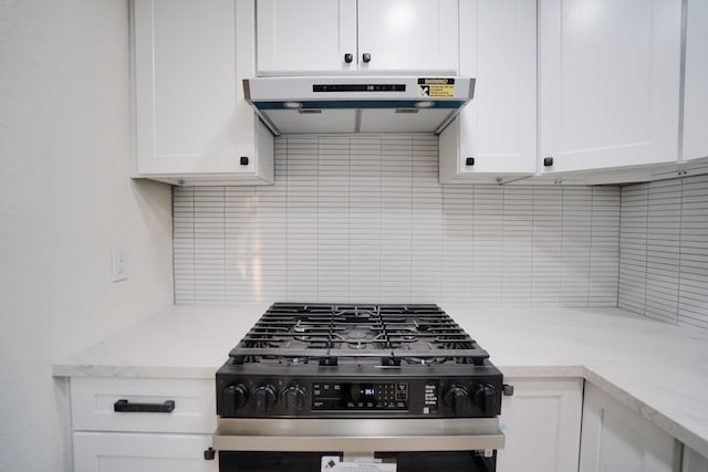 1530 E Home Ave, Fresno, CA 93728 - kitchen with gas range, decorative backsplash, ventilation hood, and white cabinets