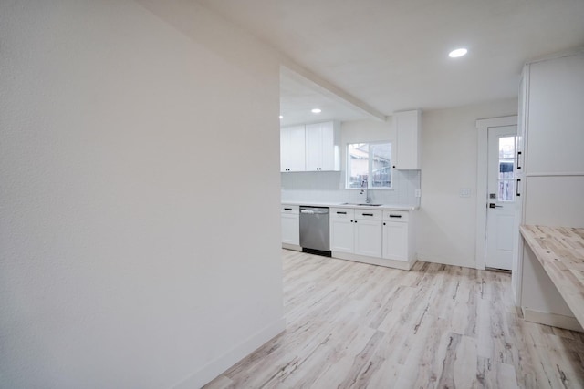 1530 E Home Ave, Fresno, CA 93728 - kitchen featuring stainless steel dishwasher, backsplash, light wood finished floors, light countertops, and recessed lighting