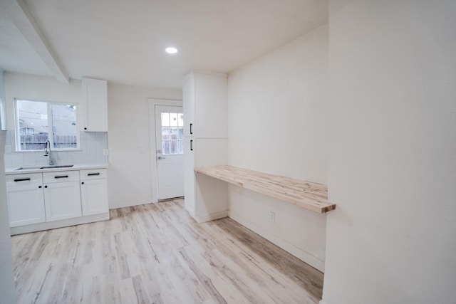 1530 E Home Ave, Fresno, CA 93728 - kitchen featuring white cabinetry, light wood-style floors, backsplash, light countertops, and recessed lighting