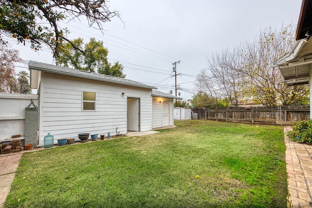 3303 E Mono Ave, Fresno, CA 93702 - fenced backyard featuring an outbuilding
