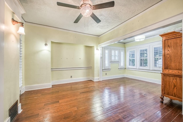 3303 E Mono Ave, Fresno, CA 93702 - empty room with a textured ceiling, ceiling fan, hardwood / wood-style flooring, and crown molding