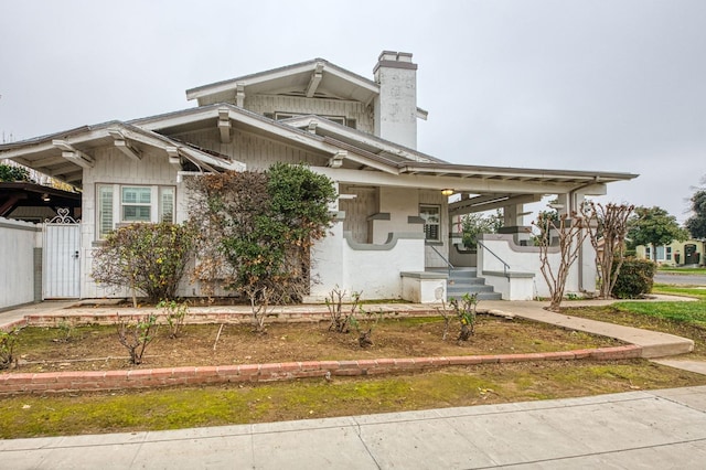 3303 E Mono Ave, Fresno, CA 93702 - view of front of property with a chimney and a porch