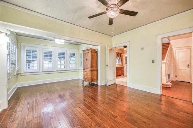 3303 E Mono Ave, Fresno, CA 93702 - unfurnished bedroom with a textured ceiling, hardwood / wood-style flooring, ornamental molding, ensuite bath, and ceiling fan