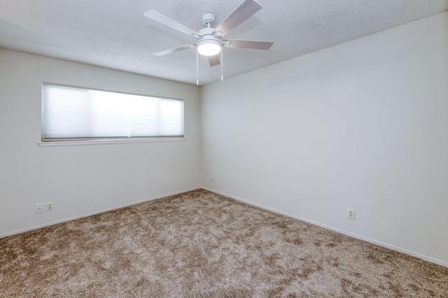 4245 N Manila Ave, Fresno, CA 93727 - carpeted empty room featuring a ceiling fan and a textured ceiling