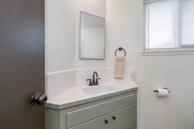 4245 N Manila Ave, Fresno, CA 93727 - bathroom featuring vanity and tasteful backsplash