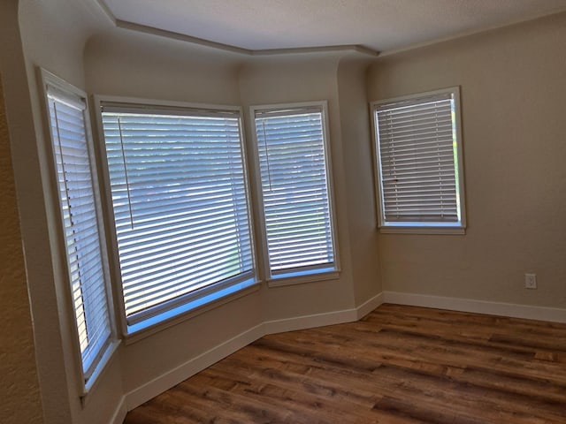 36 E Andrews Ave, Fresno, CA 93704 - unfurnished room featuring wood finished floors and baseboards