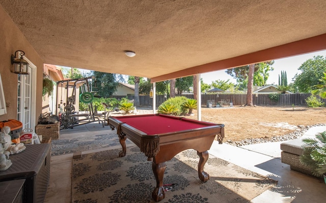 1535 S Homsy Ave, Fresno, CA 93727 - fenced backyard with a patio area