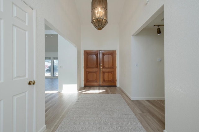 1535 S Homsy Ave, Fresno, CA 93727 - foyer featuring a chandelier and light wood-type flooring