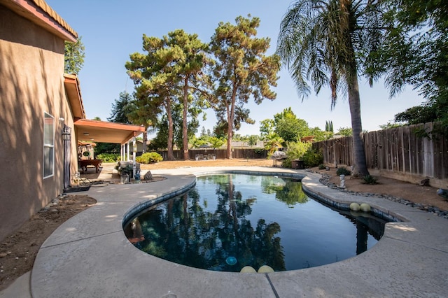 1535 S Homsy Ave, Fresno, CA 93727 - view of pool with a fenced backyard and a patio