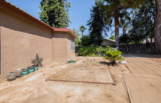 1535 S Homsy Ave, Fresno, CA 93727 - fenced backyard with a patio