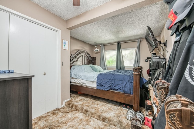 5400 Amber Ave, Clovis, CA 93619 - carpeted bedroom with a textured ceiling, a ceiling fan, and a closet
