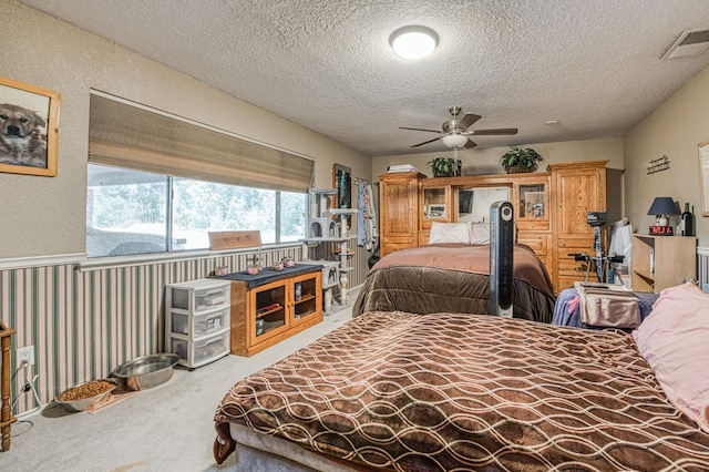 5400 Amber Ave, Clovis, CA 93619 - carpeted bedroom featuring a textured ceiling and a ceiling fan