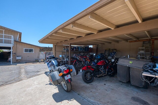 5400 Amber Ave, Clovis, CA 93619 - garage featuring a carport
