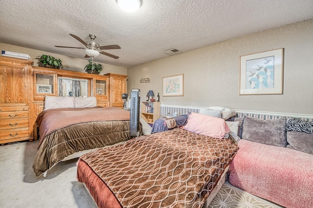 5400 Amber Ave, Clovis, CA 93619 - carpeted bedroom featuring a textured ceiling and ceiling fan