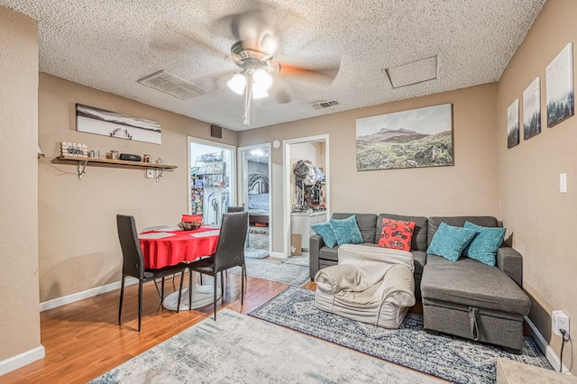5400 Amber Ave, Clovis, CA 93619 - living area featuring ceiling fan and wood finished floors