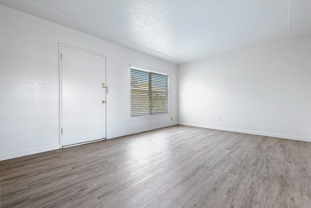 2044 Mayfair Dr W, Fresno, CA 93703 - spare room featuring wood finished floors