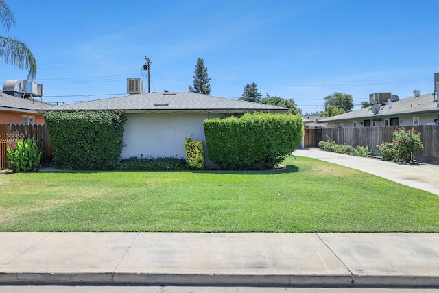 2044 Mayfair Dr W, Fresno, CA 93703 - view of home's exterior featuring stucco siding and a cooling unit