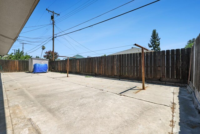 2044 Mayfair Dr W, Fresno, CA 93703 - fenced backyard with a patio area