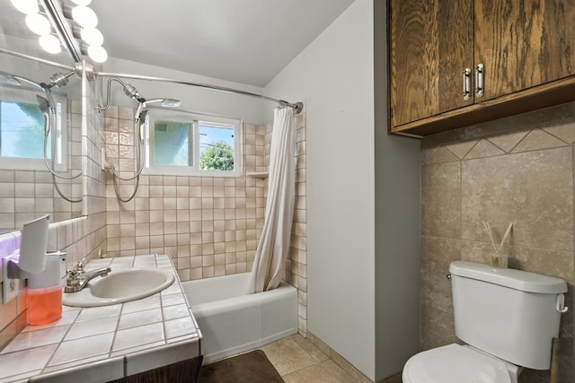 4625 E Princeton Ave, Fresno, CA 93703 - bathroom with plenty of natural light, vanity, shower / tub combo with curtain, tile walls, and tile patterned floors
