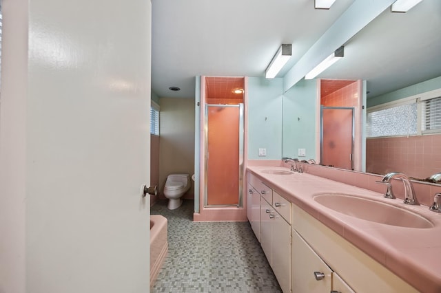 1095 W San Ramon Ave, Fresno, CA 93711 - bathroom featuring a stall shower, double vanity, tile patterned floors, and a bathtub