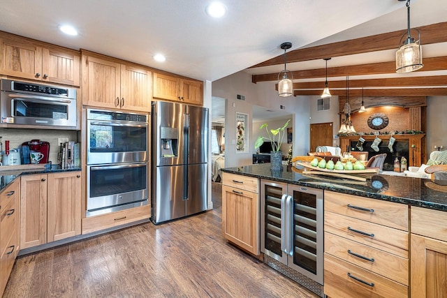 36443 Fender Ave, Madera, CA 93636 - kitchen featuring appliances with stainless steel finishes, wine cooler, beam ceiling, dark wood-style flooring, and dark stone countertops