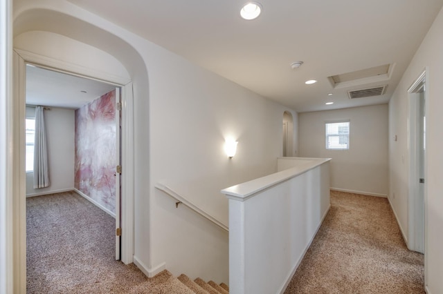 3563 Magnificent Way, Clovis, CA 93619 - hall with an upstairs landing, light carpet, recessed lighting, and attic access