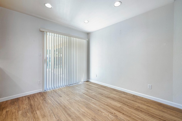 5137 W Stuart Ave, Fresno, CA 93722 - unfurnished room with light wood-style flooring and recessed lighting