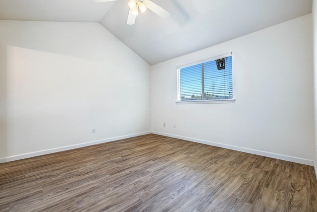 5137 W Stuart Ave, Fresno, CA 93722 - unfurnished room featuring vaulted ceiling, a ceiling fan, and wood finished floors