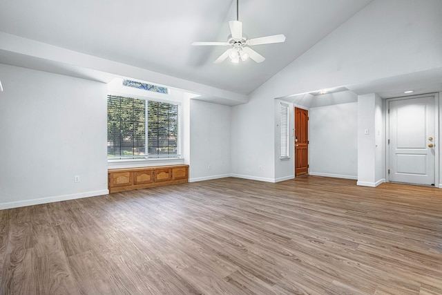 5137 W Stuart Ave, Fresno, CA 93722 - empty room with light wood-style floors, high vaulted ceiling, and ceiling fan
