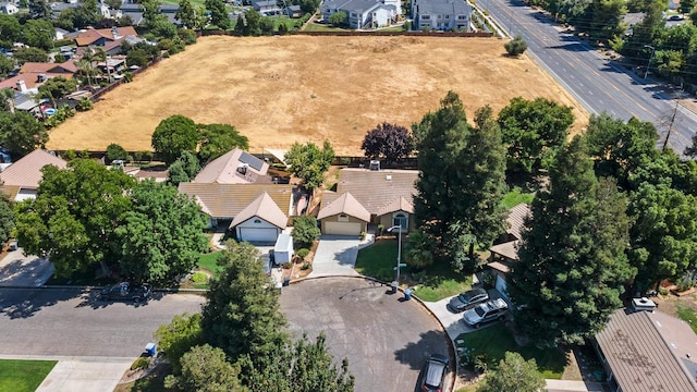 5137 W Stuart Ave, Fresno, CA 93722 - aerial overview of property's location featuring nearby suburban area