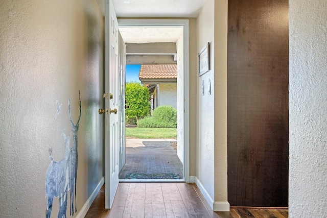 317 W Sierra Ave Unit 107, Fresno, CA 93704 - foyer featuring hardwood / wood-style floors and a textured wall