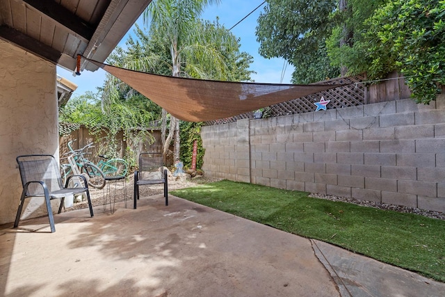 317 W Sierra Ave Unit 107, Fresno, CA 93704 - fenced backyard with a patio area