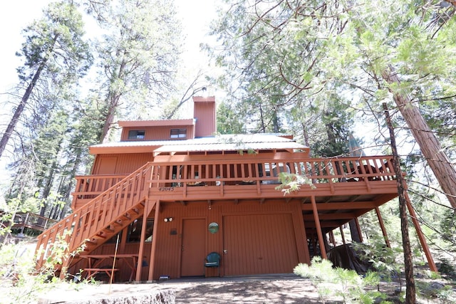 42045 Jeffrey Ln, Shaver Lake, CA 93664 - rear view of house featuring a wooden deck and stairs