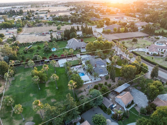 7207 E Bremer Ave, Fresno, CA 93737 - aerial perspective of suburban area featuring property parcel outlined