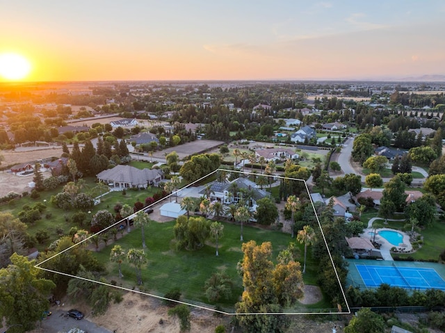 7207 E Bremer Ave, Fresno, CA 93737 - aerial perspective of suburban area featuring property parcel outlined