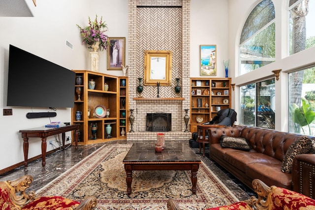 7207 E Bremer Ave, Fresno, CA 93737 - living room with a towering ceiling and a brick fireplace
