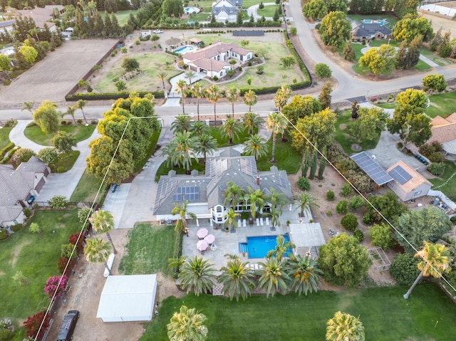 7207 E Bremer Ave, Fresno, CA 93737 - aerial perspective of suburban area with a pool