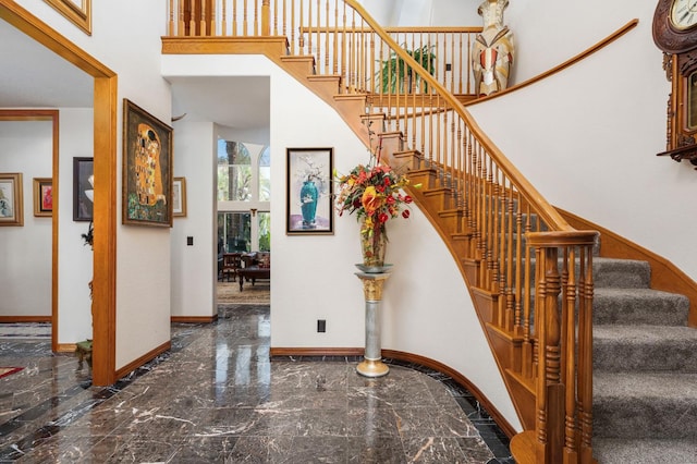 7207 E Bremer Ave, Fresno, CA 93737 - stairway with marble tiled floors and a high ceiling