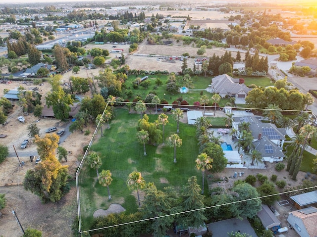 7207 E Bremer Ave, Fresno, CA 93737 - aerial perspective of suburban area with property boundaries highlighted