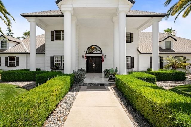 7207 E Bremer Ave, Fresno, CA 93737 - view of front of property featuring a porch and roof with shingles