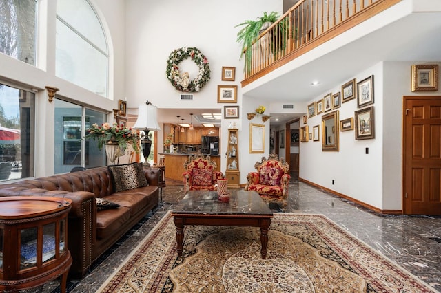 7207 E Bremer Ave, Fresno, CA 93737 - living room with marble tiled floors and a high ceiling