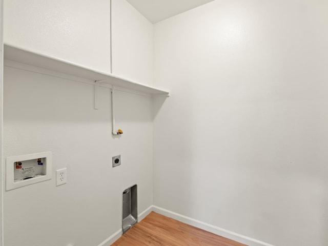 2303 S Bush Ave, Fresno, CA 93727 - laundry area featuring hookup for a washing machine, light wood-style floors, and electric dryer hookup